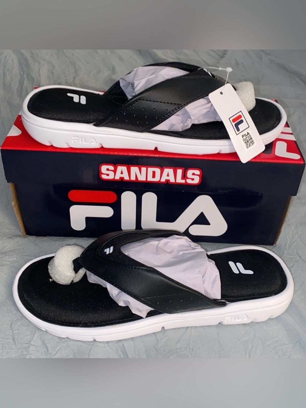 Fila Women’s Black and White Sandals with Classic Design size 7